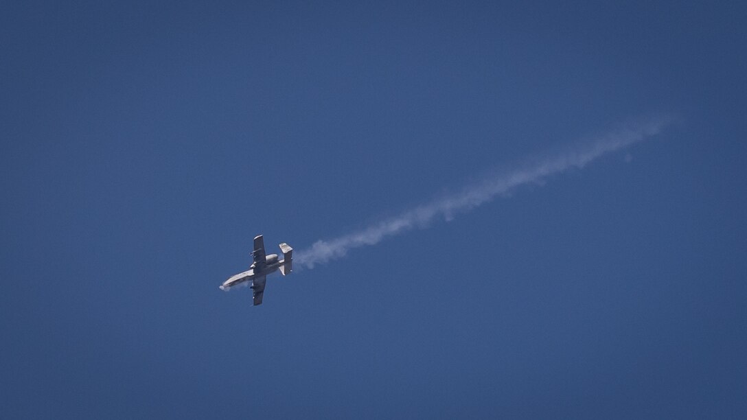 An A-10 Thunderbolt II from the 25th Fighter Squadron, Osan Air Base, performs a strafing run during close air support training over the Pilsung Range in Gangwan Province, Republic of Korea, Feb. 14, 2018.