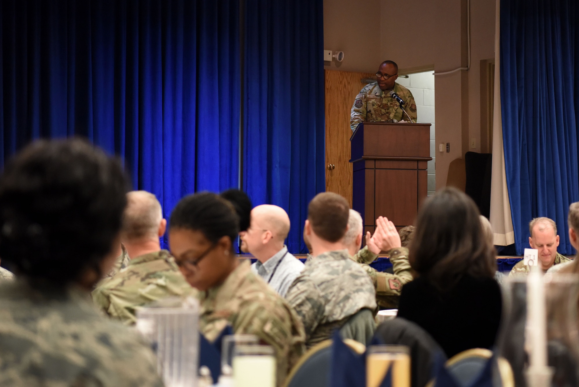 U.S. Air Force Chaplain Capt. Joseph Idomele, 51st Fighter Wing chaplain, introduces the guest speaker for the Chaplain Corps resiliency luncheon held at the Officer’s Club on Osan Air Base, Republic of Korea, Feb. 21, 2019. The event’s guest speaker was retired Air Force Chief of Chaplains, Maj. Gen. Dondi Costin. (U.S. Air Force photo by Senior Airman Kelsey Tucker)