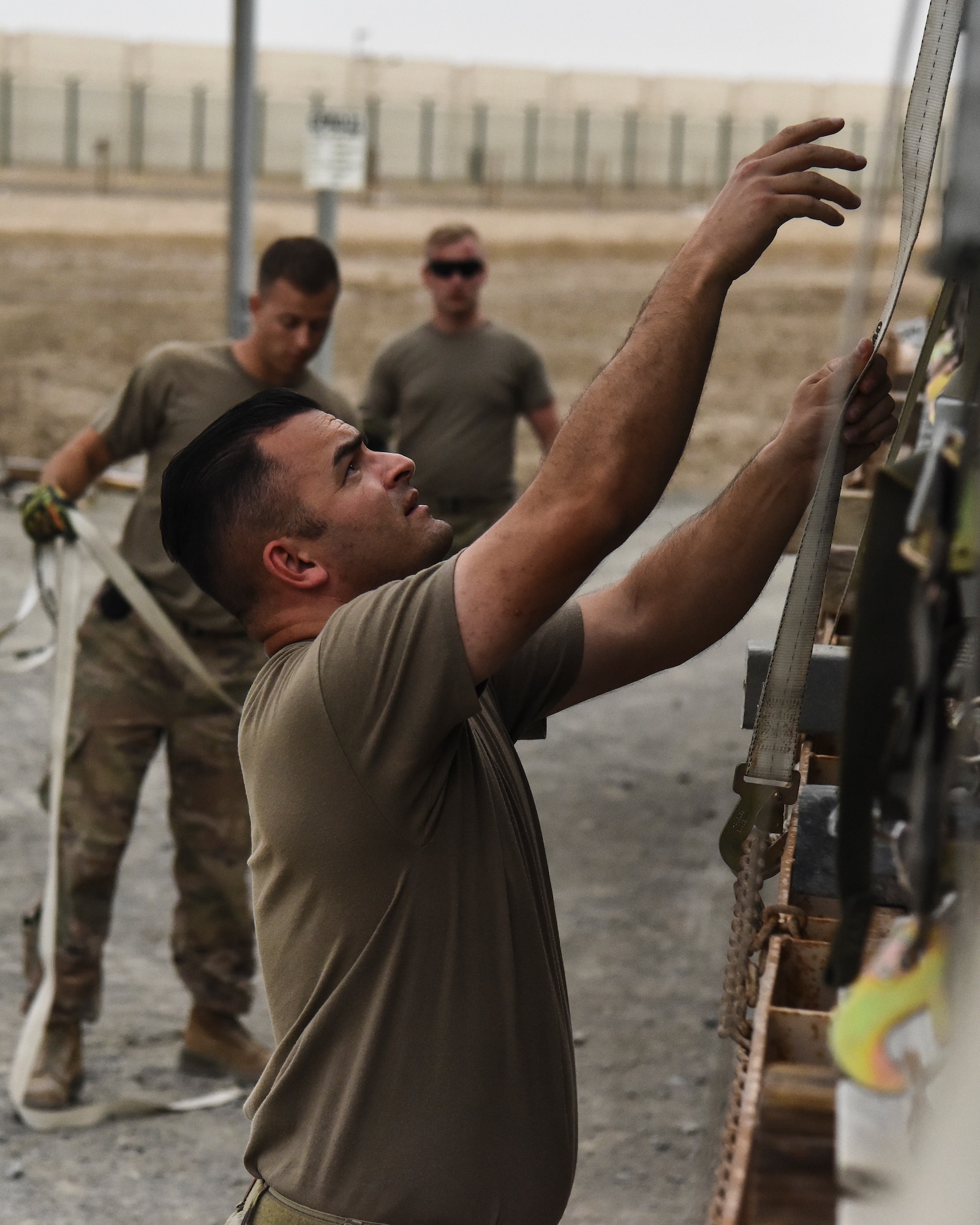 Airmen assigned to the 380th Expeditionary Maintenance Squadron munitions flight, load guiding sections at Al Dhafra Air Base, United Arab Emirates, Feb. 15, 2019. The 380th EMXS munitions flight, also known as Ammo flight, is a 10-man team that has heavily supported the 380th Expeditionary Civil Engineer Squadron Explosive Ordnance Disposal flight, 380th Expeditionary Security Forces Squadron K-9 unit, Army Search and Rescue teams, Navy SEAL teams, coalition forces and host nation forces through the U.S. Central Command’s area of responsibility. (U.S. Air Force photo by Senior Airman Mya M. Crosby)