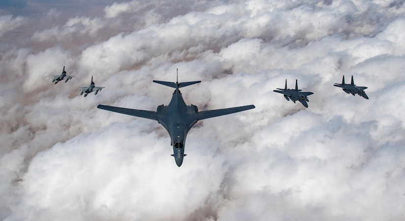 Qatari Mirage 2000s, a U.S. Air Force B-1B Lancer bomber and F-15E Strike Eagles fly in formation during Joint Air Defense Exercise 19-01, Feb. 19, 2019. JADEX provides an opportunity to strengthen military-to-military relationships with the Qatari air force while conducting combined air operations with partners. (U.S. Air Force photo by Staff Sgt. Clayton Cupit)
