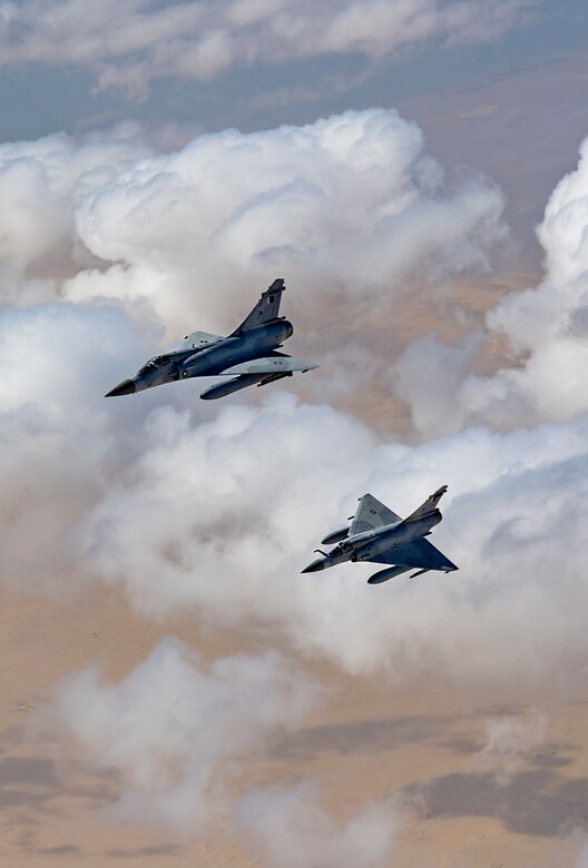 Two Qatari Mirage 2000s fly in formation during Joint Air Defense Exercise 19-01, Feb. 19, 2019. The aircraft participated with U.S. and regional partners to test objective-based command and control actions during the exercise. (U.S. Air Force photo by Staff Sgt. Clayton Cupit)