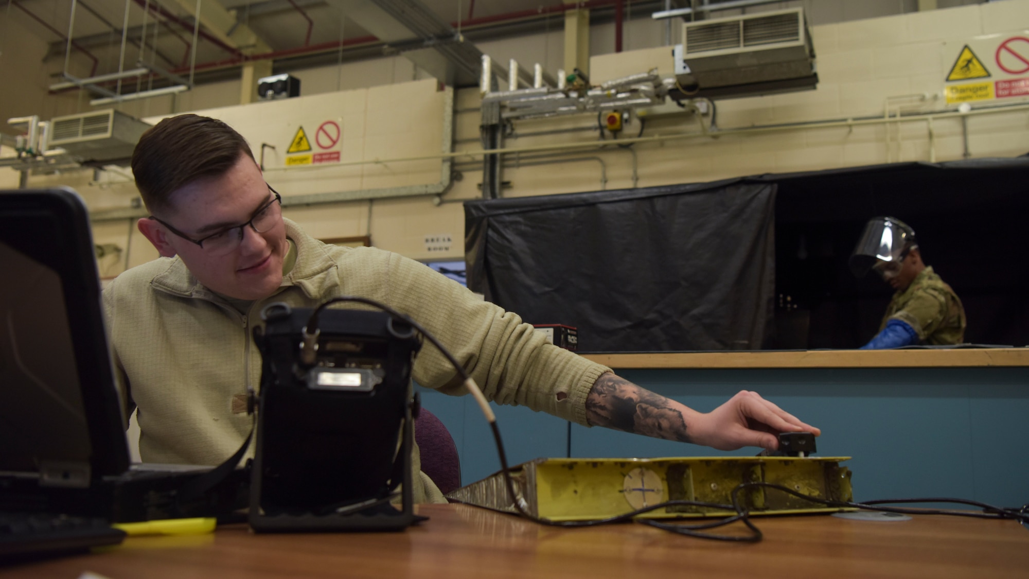 U.S. Air Force Airman 1st Class Alex Dixson, 100th Maintenance Squadron non-destructive inspection apprentice, uses an ultrasonic inspection tool to perform a bond test on a sample panel at RAF Mildenhall, England, Feb. 7, 2019. The tool is used to check for separation in parts, finding potential weak points throughout the panels of an aircraft.  (U.S. Air Force photo by Airman 1st Class Alexandria Lee)