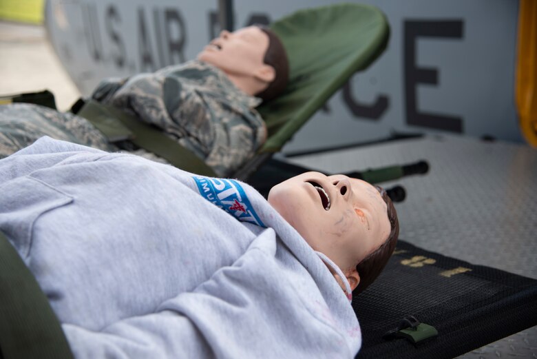 Training dummies await loading onto a 384th Air Refueling Squadron KC-135 Stratotanker during an aeromedical evacuation exercise near Kadena Air Base, Japan, Feb. 19, 2019. Eleven Team Fairchild Airmen traveled to Japan to participate in the exercise and learn new skills for a mission-set that is uncommon at home, but is vital to disaster recovery or deployed location missions they may be tasked to support. (U.S. Air Force photo by Senior Airman Ryan Lackey)