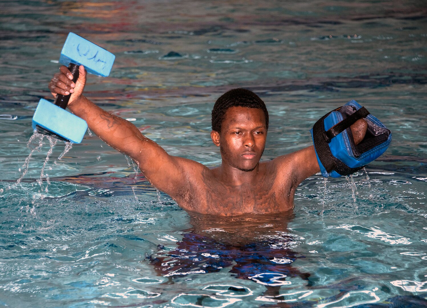 U.S. Army Staff Sgt. Kayshawn Porterfield exercises in the pool at Brooke Army Medical Center’s Center for the Intrepid at Joint Base San Antonio-Fort Sam Houston Feb. 20. Aquatic therapy is used to improve balance, coordination and flexibility as well as building muscle strength and endurance.