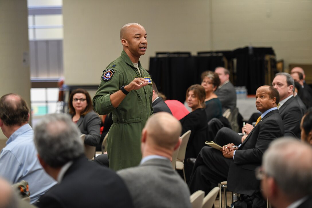 Lt. Col. Randy Gordon of the Air Force’s AFWERX program addresses more than 100 industry representatives during the Feb. 20 Multi-Domain Command and Control Industry Day, held at the Minuteman Educational Center in Lexington, Mass. Gordon compared AFWERX and MDC2 efforts with the Doolittle Raiders, who innovated and iterated their way to launch bombers off aircraft carriers to strike at the industrial heart of Japan during World War II. (U.S. Air Force photo by Jerry Saslav)
