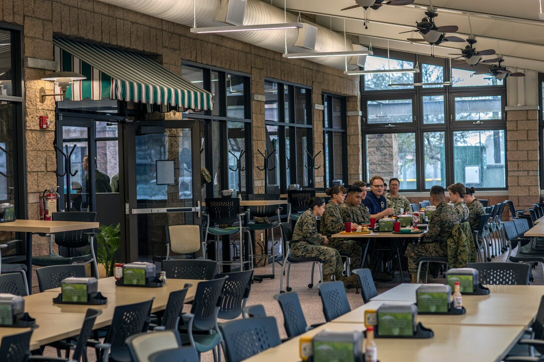 Honorable Mr. Thomas B. Modly, the Undersecretary of the Navy, converses with Marines from Marine Corps Air Station Miramar about their experiences in the Marine Corps during lunch at MCAS Miramar, Calif., Feb. 15. Modly visited MCAS Miramar to learn about current and future projects being conducted on the installation as well as what it takes to support the joint force from San Diego. (U.S. Marine Corps photo by Sgt. Jake McClung)