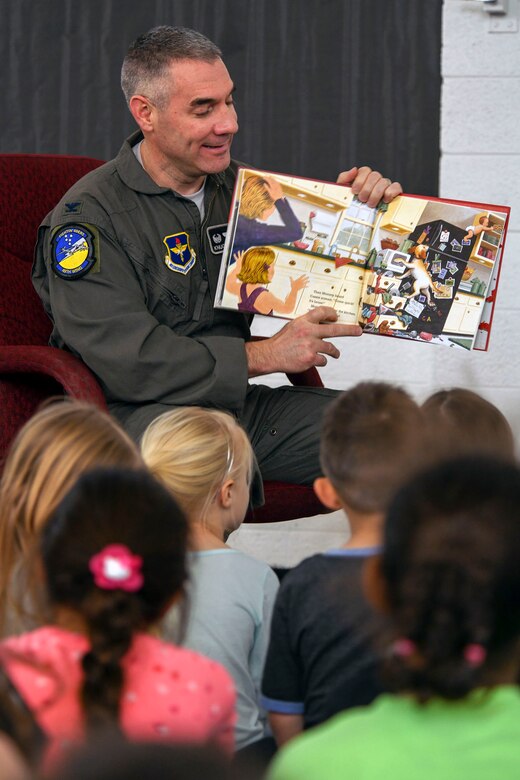 Col. Joseph Campo, 49th Wing commander, reads to children at Holloman Elementary School, Feb. 21, 2019, on Holloman Air Force Base, N.M. One of Campo’s priorities while in command include improving the education system in the local and on base communities. (U.S Air Force photo by Staff Sgt. Christine Groening)