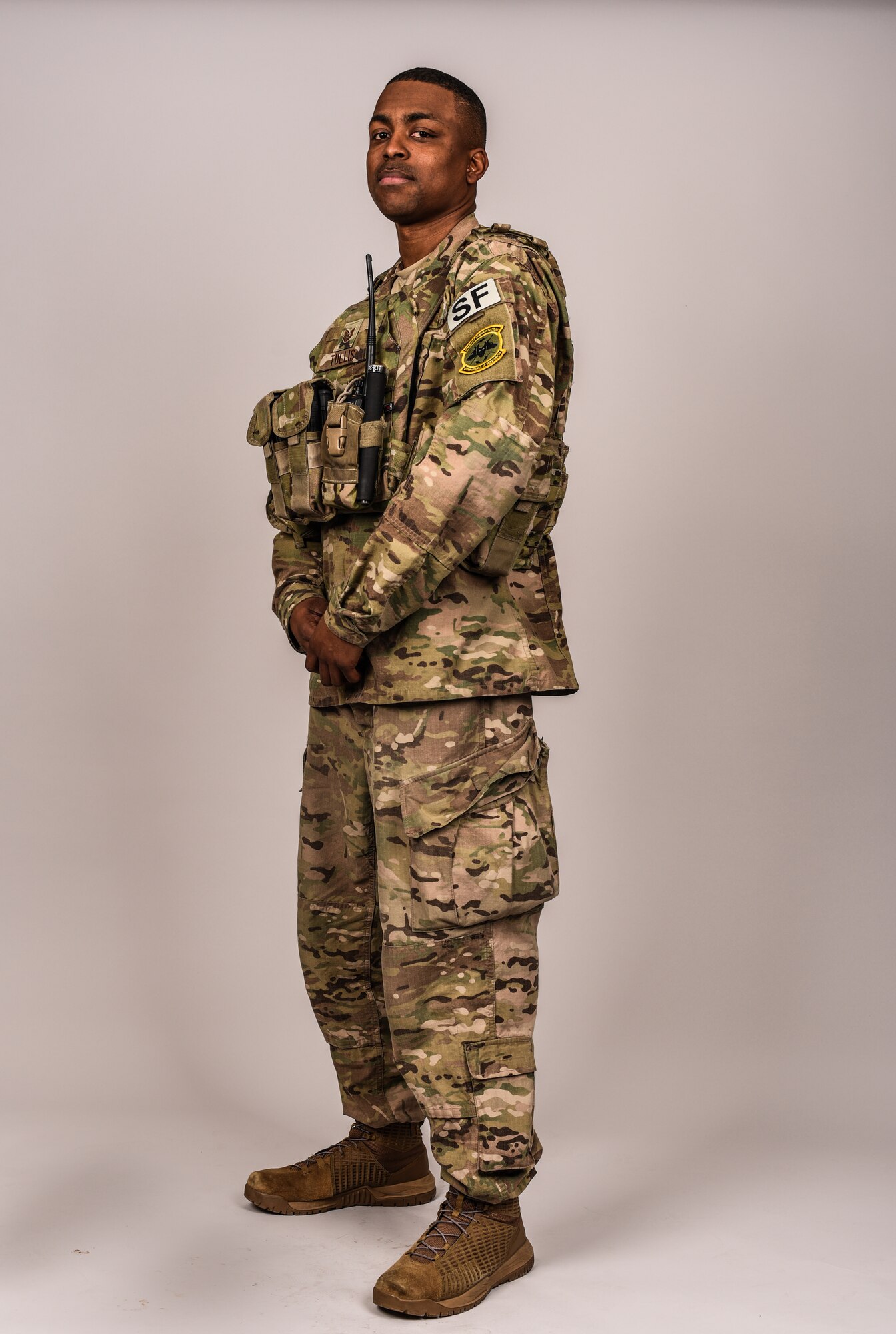 Tech. Sgt. Darrin Tullis, 890th Missile Security Forces Squadron Echo flight chief, shows off his 890 excellence patch Feb. 13, 2019, at F.E. Warren Air Force Base, Wyo. The patch is awarded to Airmen who practice the core value, excellence in all we do, by shooting expert on the M9 and M4, have at least a 90 on the Air Force Physical Fitness Test, a passing score on the Marine Combat Fitness Test, completed their CCAF and are green on all standards. Additionally, noncommissioned officers must be exceptionally well qualified in their duty position. (U.S. Air Force photo by Senior Airman Abbigayle Williams)