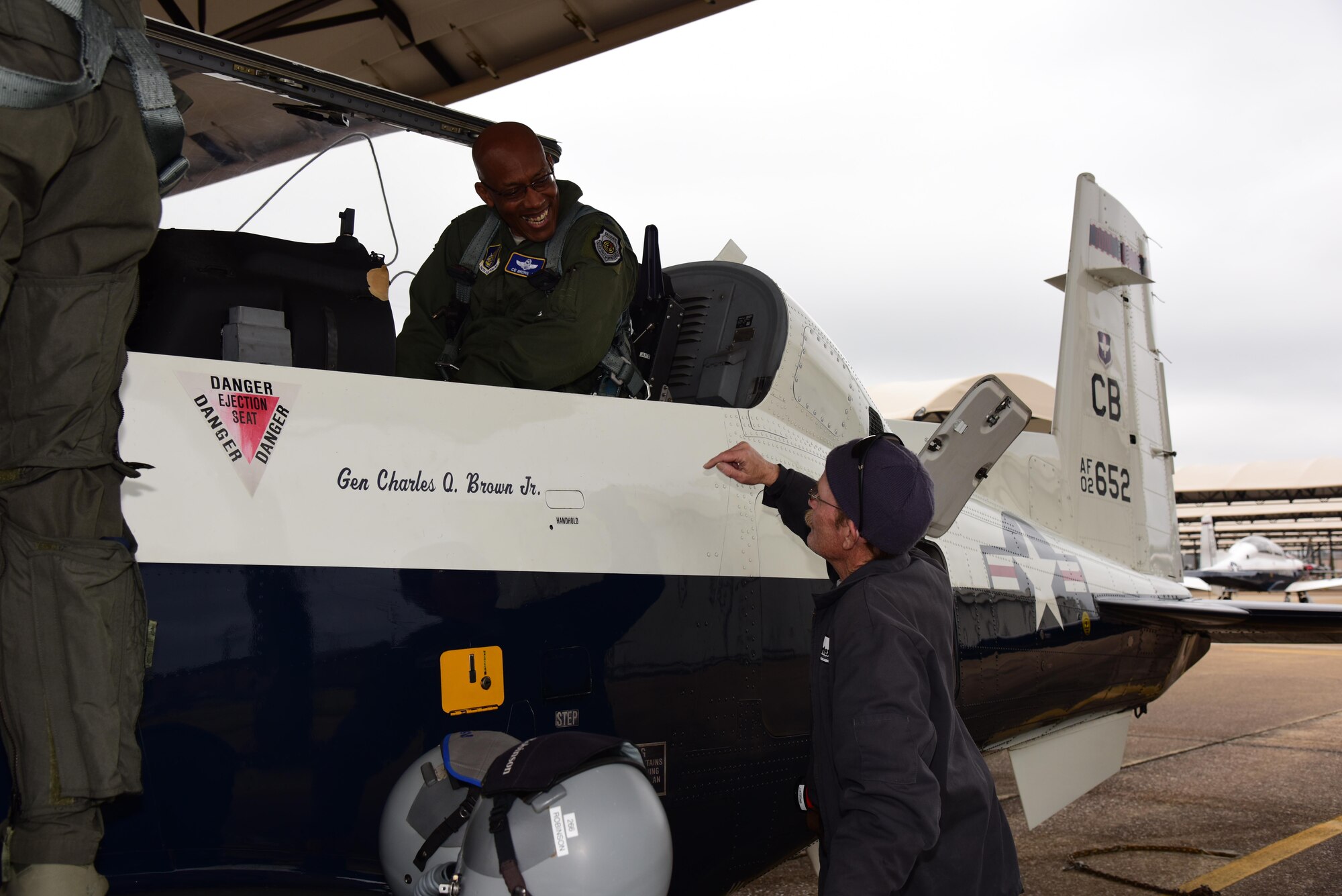 Gen. Charles Q. Brown Jr., the Commander, Pacific Air Forces; Air Component Commander for U.S. Indo-Pacific Command; and Executive Director, Pacific Air Combat Operations Staff, Joint Base Pearl Harbor-Hickam, Hawaii, talks with a Vertex Aerospace maintainer Feb. 15, 2019, on Columbus Air Force Base, Mississippi. Brown has flown over 17 different aircraft and had his first T-6A Texan II ride here. (U.S. Air Force photo by Elizabeth Owens)