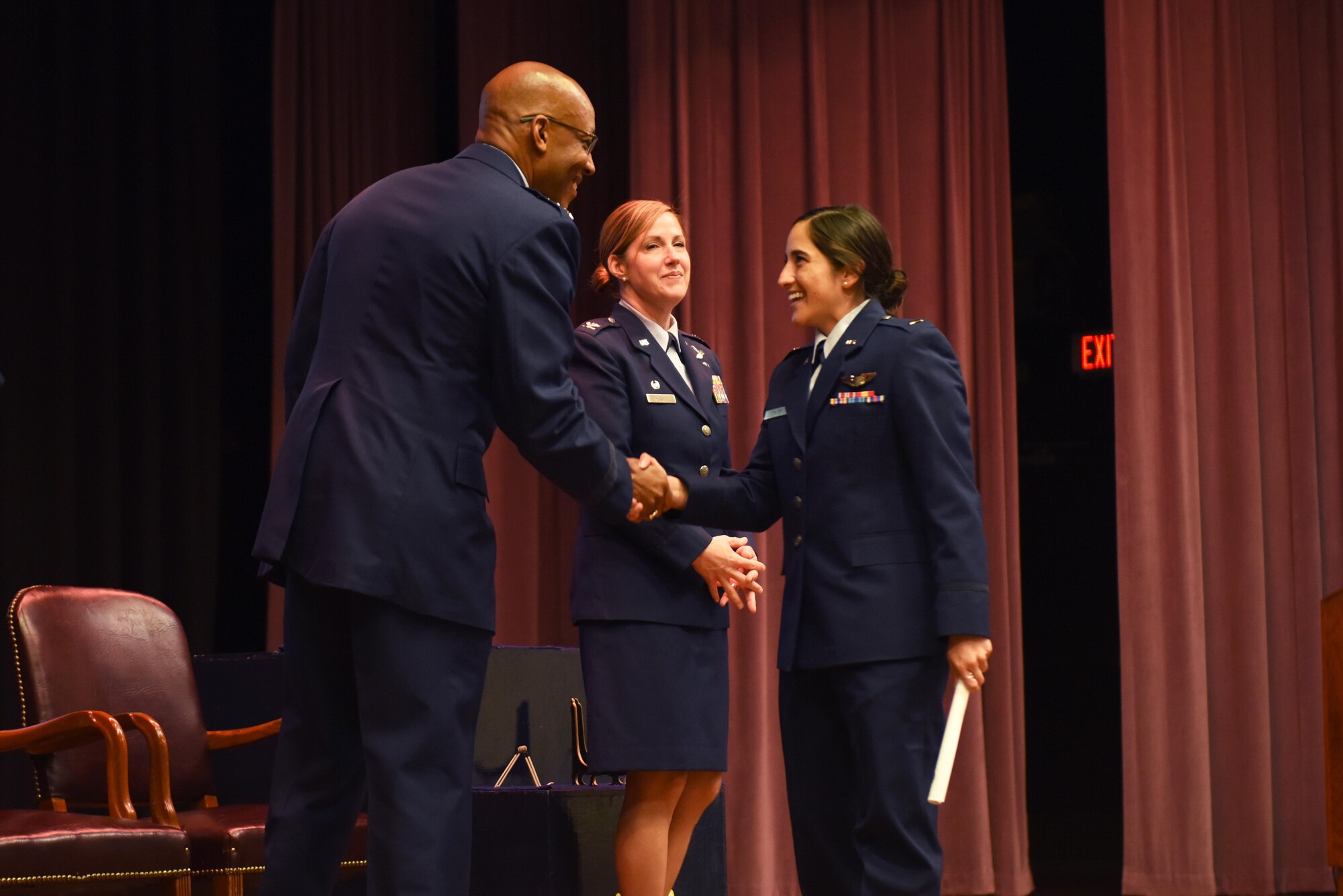 Gen. Charles Q. Brown Jr., the Commander, Pacific Air Forces; Air Component Commander for U.S. Indo-Pacific Command; and Executive Director, Pacific Air Combat Operations Staff, Joint Base Pearl Harbor-Hickam, Hawaii, congratulates 2nd Lt. Katleen Ybarra, 14th Student Squadron student pilot, on earning her Silver Wings Feb. 15, 2019, on Columbus Air Force Base, Mississippi. Ybarra graduated flying the T-1A Jayhawk, and will go on to fly the KC-135 Stratotanker. (U.S. Air Force photo by Senior Airmen Beaux Hebert)