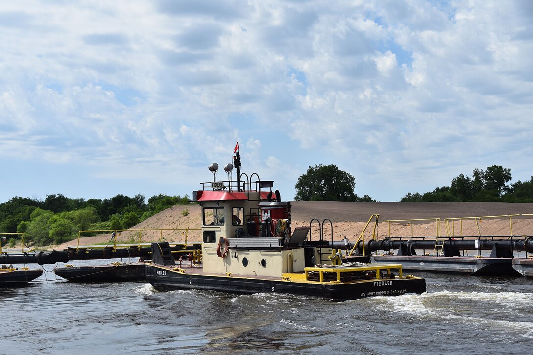 dredge boat on river