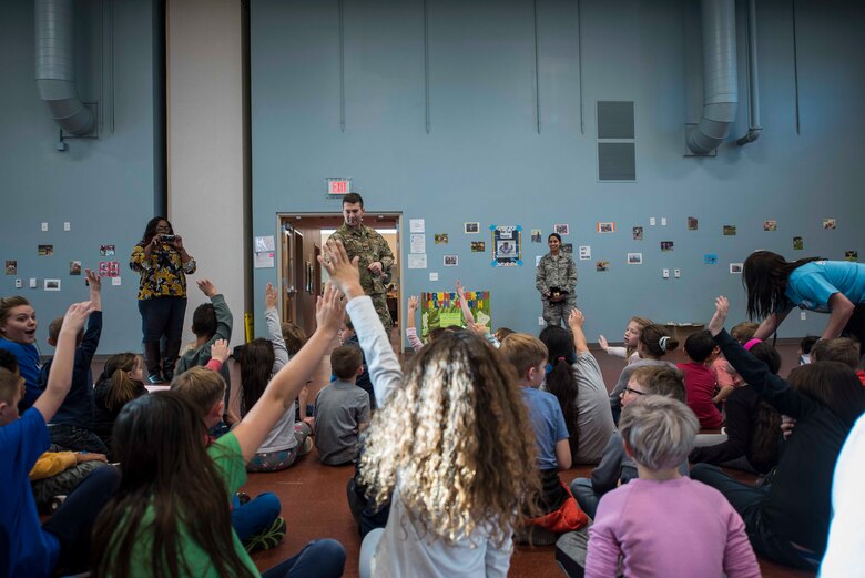 Capt. Zachary Kapotes, 27th Special Operations Aerospace Medicine Squadron general dentist, answers questions about dental health at a Children’s Dental Health Month event at Cannon Air Force Base, N.M., Feb. 21, 2019. After a brief oration on dental health, Kapotes turned the floor over to the youth to ask their own questions about oral hygiene. (U.S. Air Force Photo by Airman 1st Class Vernon R. Walter III)