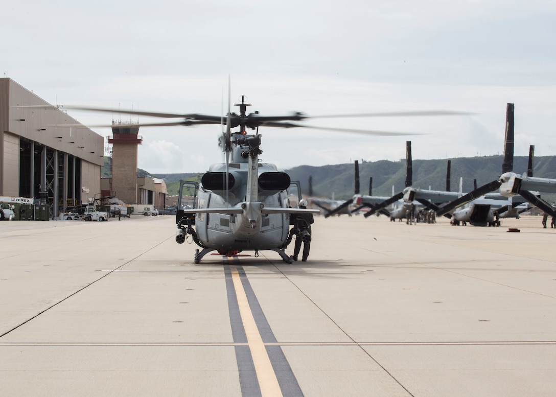 A UH-1Y with Marine Light Attack Helicopter Squadron (HMLA) 469, Marine Aircraft Group (MAG) 39, 3rd Marine Aircraft Wing (MAW), stages in preparation for a training exercise at Marine Corps Air Station Camp Pendleton, Calif., Feb. 15. In a dynamic display of strength, MAG-39, launched more than 82 attack, utility and assault support aircraft. Maintainers and ground support crews watched with pride and a strong sense of accomplishment as each of their aircraft fulfilled its role in formation, took to the sky, then disappeared over the horizon. Over the course of several hours, more than 100 aircraft from MAG-13 and MAG-39 took to the skies over Southern California, proving 3rd MAW’s capability to “Fix, Fly, Fight” and, when needed advance at a moment’s notice. (U.S. Marine Corps photo by Cpl. Samuel Ruiz)