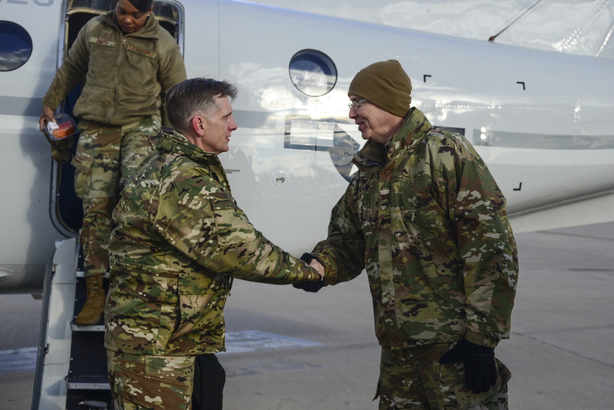 Col. Richard Gibbs (right), 377th Air Base Wing commander, greets Air Force Global Strike Command commander Gen. Timothy Ray upon arrival at Kirtland Air Force Base, N.M., Feb. 19, 2019. The general made a two-day visit to the base and Kirtland’s 377th ABW, having meals with 377th ABW Airmen, receiving briefings and meeting with wing leadership and key spouses. (U.S. Air Force photo by Staff Sgt. Kimberly Nagle)