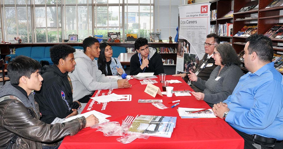 U.S. Army Corps of Engineers Los Angeles District employees Alfonso Quintero, Raina Fulton and Chadi Wahby talk about their careers with ninth to 12th grade students Feb. 13 during John Muir High School’s Engineering and Environmental Science Academy Career Exploration Showcase Day in Pasadena, California.