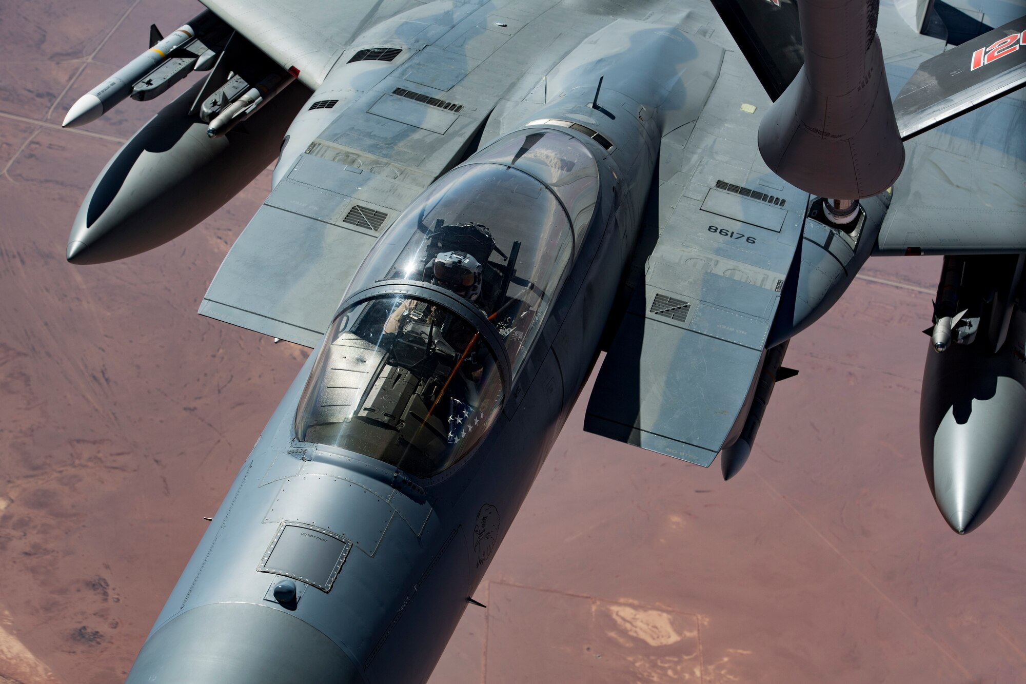 A U.S. Air Force F-15C Eagle is refueled by a KC-135 Stratotanker from the 28th Expeditionary Air Refueling Squadron while flying in support of Combined Joint Task Force – Operation Inherent Resolve Feb. 11, 2019. The tactical fighters add an additional layer of support to coalition forces on the ground. U.S. Air Forces Central Command Airmen, Joint personnel Coalition partners stand ready to defend our forces from any threat. (U.S. Air Force photo by Staff Sgt. Clayton Cupit)