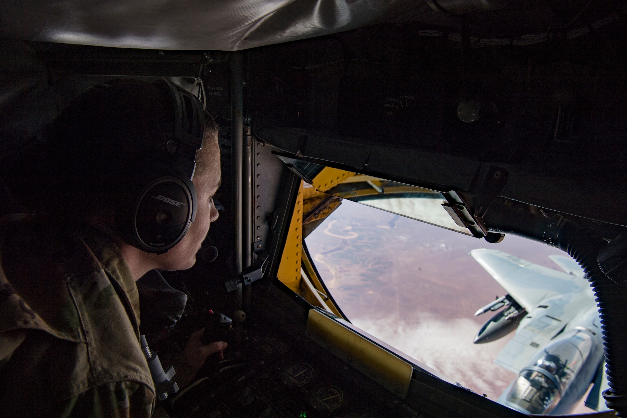 A U.S. Air Force boom operator with the 28th Expeditionary Air Refueling Squadron refuels an F-15C Eagle while flying in support of Combined Joint Task Force – Operation Inherent Resolve Feb. 11, 2019. The Eagles add an additional layer of support to coalition forces on the ground. U.S. Air Forces Central Command Airmen operate any time, any place and under any conditions in order to maintain air superiority and protect ground forces. (U.S. Air Force photo by Staff Sgt. Clayton Cupit)