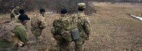Georgian trainers and U.S. Soldiers from the 1st Armored Brigade Combat Brigade, 1st Infantry Division observe as Georgian Soldiers in the 13th Infantry Battalion move through offensive and defensive situational training lanes, at Norio Training Area, Republic of Georgia, Feb. 20, 2019.