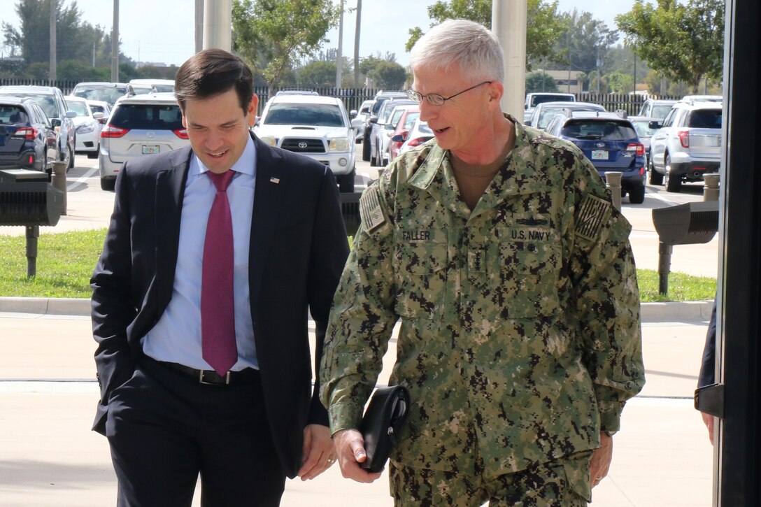 Sen. Marco Rubio speaks with Navy Adm. Craig Faller, commander of U.S. Southern Command.