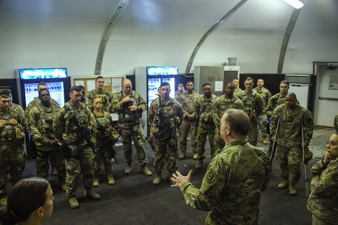 U.S. Air Force Lt. Gen. Richard Scobee, commander of Air Force Reserve Command, speaks to 380th Expeditionary Security Forces Squadron Airmen during his visit to Al Dhafra Air Base, United Arab Emirates, Feb. 13, 2019.