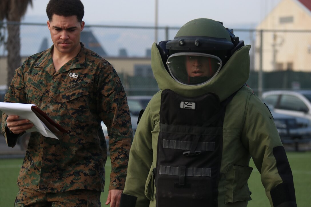 A U.S. Marine with Special Purpose Marine Air-Ground Task Force-Crisis Response-Africa 19.1, Marine Forces Europe and Africa, supervises a Marine conducting the Explosive Ordnance Disposal Lateral Move Screener on Naval Air Station Sigonella, Italy, Feb. 7, 2019. SPMAGTF-CR-AF is deployed to conduct crisis-response and theater-security operations in Europe and Africa. (U.S. Marine Corps photo by 1st Lt. Christin St. John)