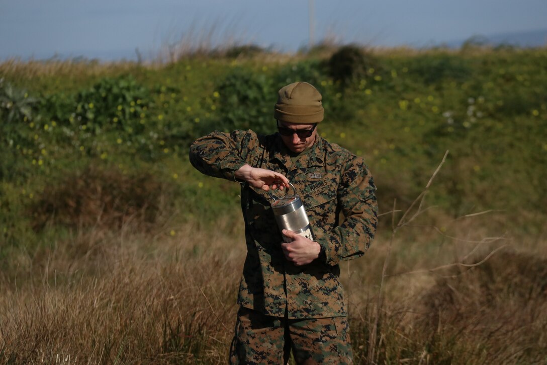 A U.S. Marine with Special Purpose Marine Air-Ground Task Force-Crisis Response-Africa 19.1, Marine Forces Europe and Africa, prepares materials on an explosive ordinance disposal range in Sigonella, Italy, Jan. 31, 2019. SPMAGTF-CR-AF is deployed to conduct crisis-response and theater-security operations in Europe and Africa. (U.S. Marine Corps photo by 1st Lt. Christin St. John)
