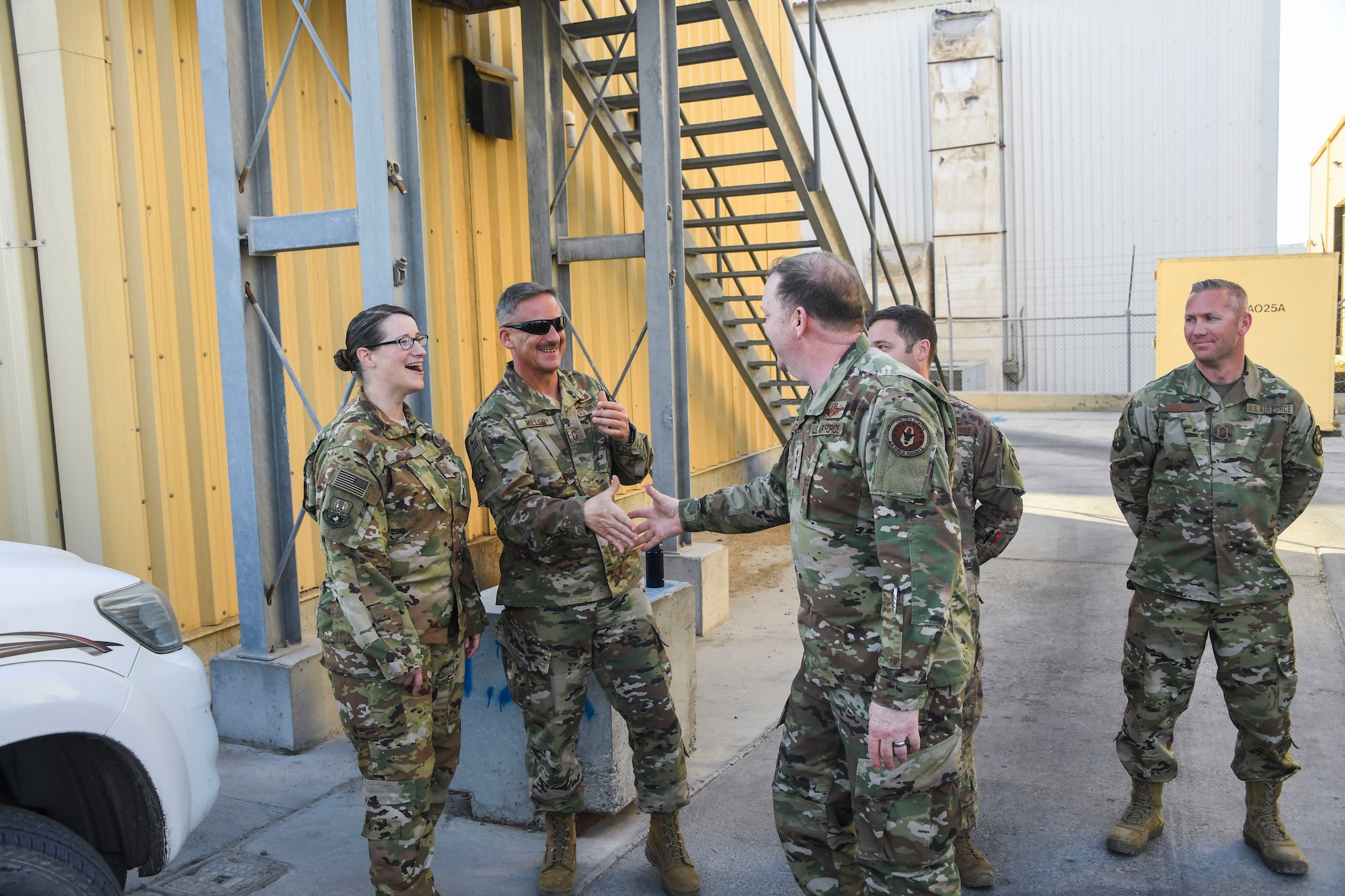 U.S. Air Force Lt. Gen. Richard Scobee, commander of Air Force Reserve Command, greets members of the 380th Expeditionary Operations Group during his visit to Al Dhafra Air Base, United Arab Emirates, Feb. 13, 2019.