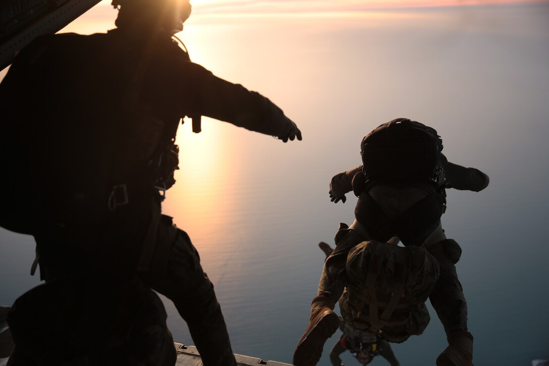 U.S. Marines with Special Purpose Marine Air-Ground Task Force-Crisis Response-Africa 19.1, Marine Forces Europe and Africa, along with members of the Spanish Army conduct a personnel air-drop operation in Rota, Spain, Feb. 6, 2019.