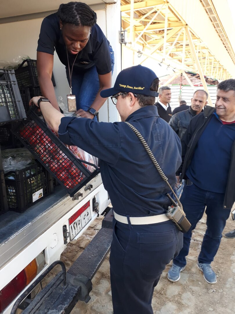 avy logisticians with Combined Task Force 53 receive a delivery of fresh fruits and vegetables