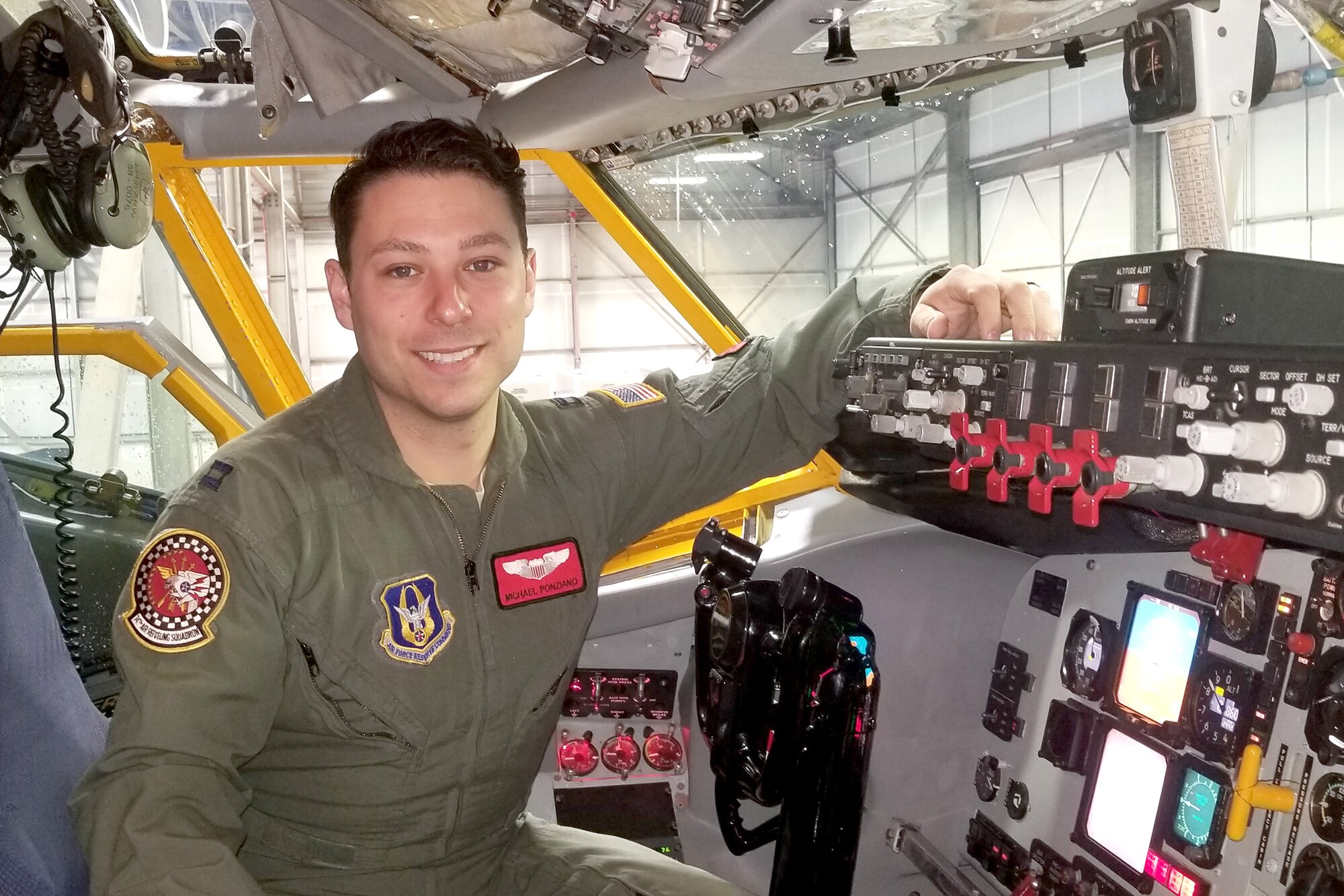 Capt. Michael Ponziano, 74th Air Refueling Squadron KC-135R Stratotanker pilot, poses for a photo inside the cockpit of a 434th Air Refueling Wing KC-135 at Grissom Air Reserve Base, Ind., Feb. 06, 2019. Ponziano uses his experience as an Air Force pilot to help educate others interested in following the same career path. (U.S. Air Force photo/Master Sgt. Ben Mota)