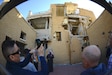 Soldiers with the Minnesota National Guard’s 34th Red Bull Infantry Division visit the Al-Qurain Martyrs Museum in Kuwait City Feb. 20, 2019, surveying the damage inflicted on a house by heavy weaponry, including an Iraqi tank, during a battle in the Gulf War that occurred Feb. 24, 1991, between members of the Al Messilah Group (Kuwait forces) and Saddam Hussein’s forces. The Soldiers partnered with their Kuwaiti hosts to learn about the history of the invasion of Kuwait and the national and international response that liberated the nation. The Soldiers, currently deployed to the region as Task Force Spartan, also visited a nearby military base where Kuwaiti soldiers walked through the broader picture of the conflict on an immense sand-table of the country.