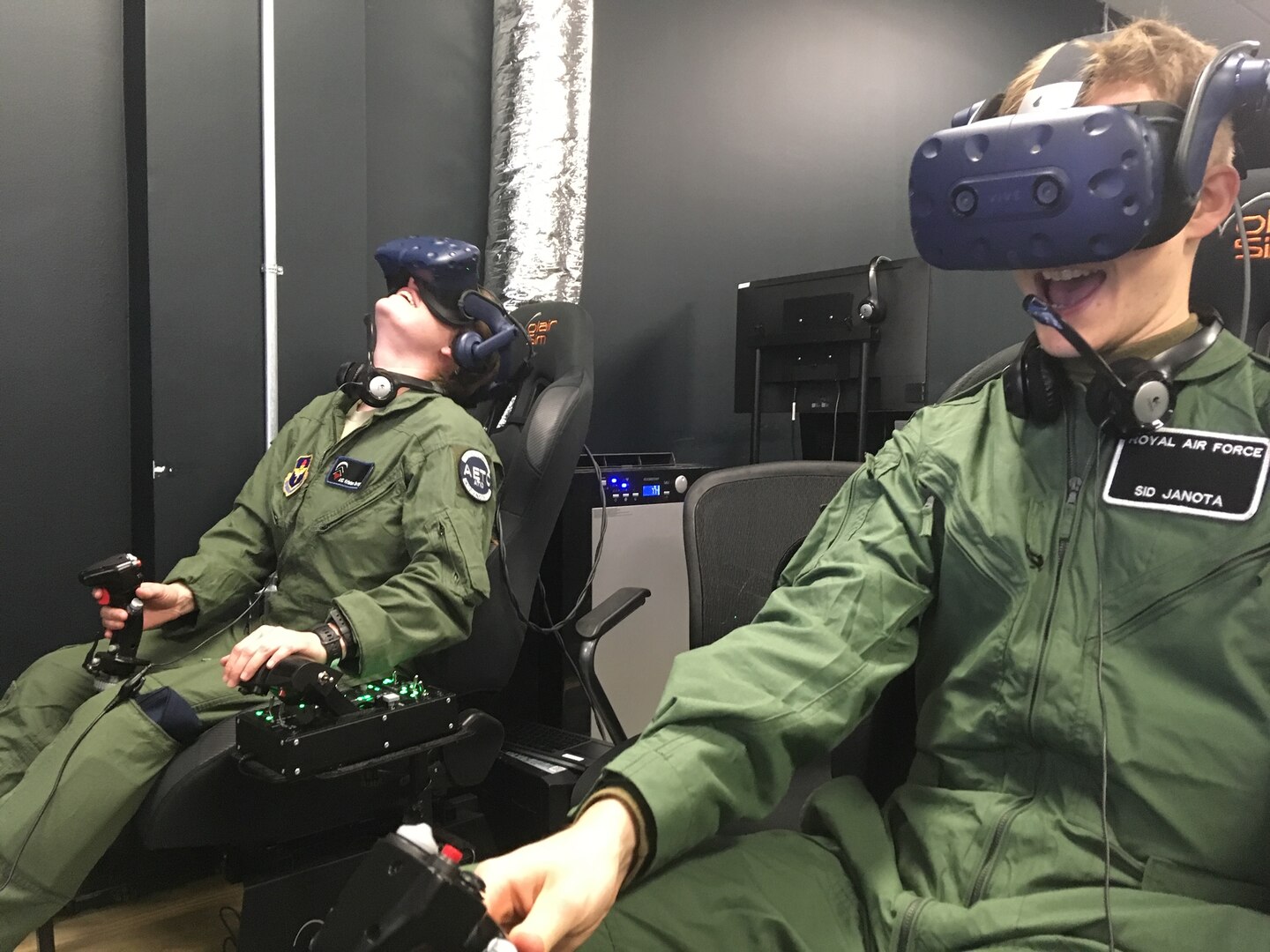 Two students in Pilot Training Next 2.0 fly a virtual-reality training sortie Jan. 18, 2019, at the Armed Forces Reserve Center, located near the Austin-Bergstrom International Airport in Austin, Texas. The instruction in this second version is shaped from the success of and lessons learned from the first PTN program, where 13 officers graduated in June 2018 and progressed to advanced training across multiple platforms. (U.S. Air Force photo/1Lt Geneva Giaimo)