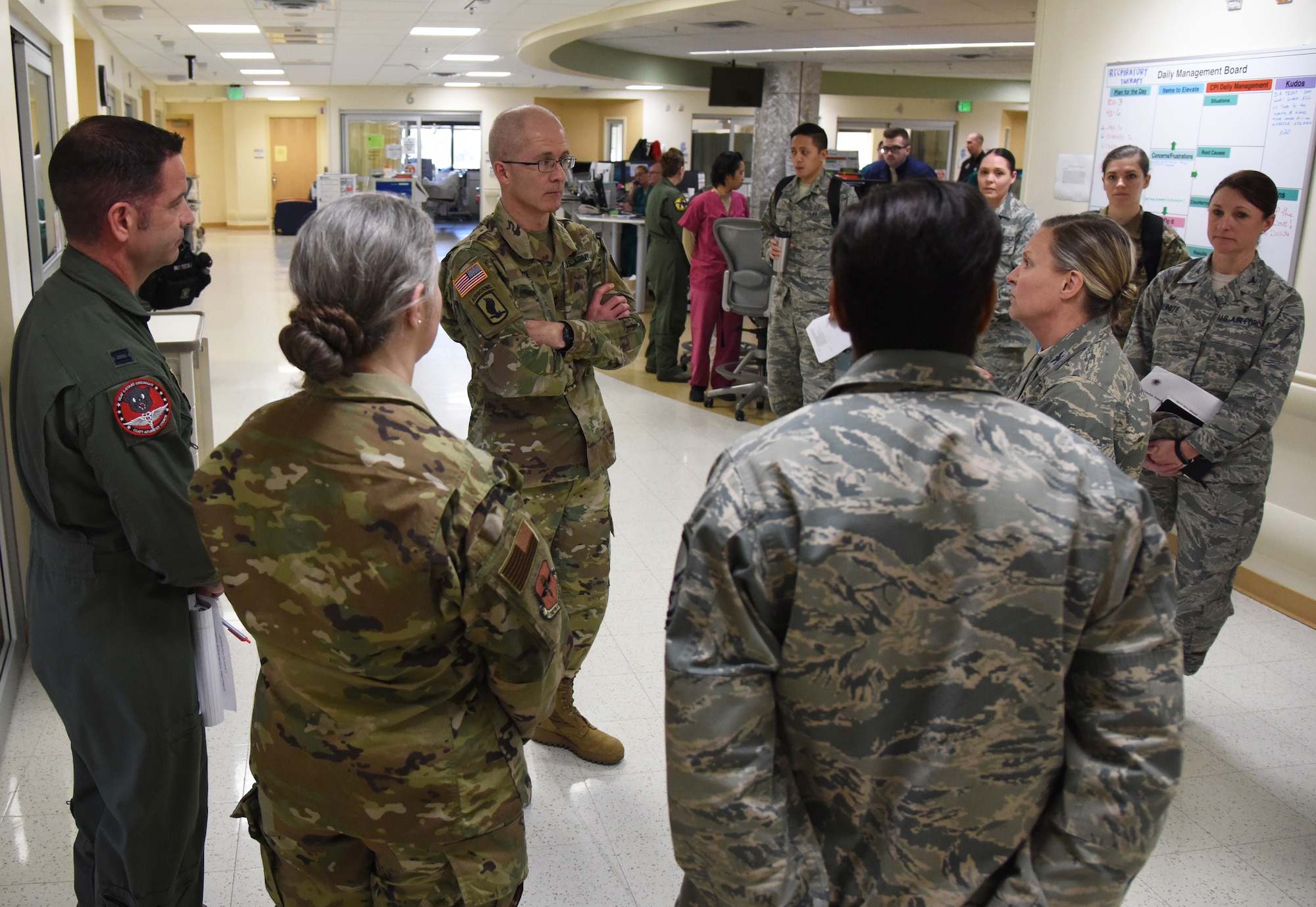 U.S. Air Force Col. Michelle Aastrom, 81st Inpatient Operation Squadron commander, discusses the intensive care unit capabilities with U.S. Army Maj. Gen. Ronald Place, Defense Health Agency, director for the National Capital Region Medical Directorate and Transition Intermediate Management Organization, during an immersion tour inside the Keesler Medical Center at Keesler Air Force Base, Mississippi, Feb. 13, 2019. The purpose of Place's two-day visit was to become more familiar with the medical center's mission capabilities and to receive the status of the 81st Medical Group's transition under DHA. (U.S. Air Force photo by Kemberly Groue)