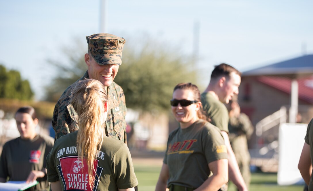 U.S. Marine Corps Lt. Col. James C. Paxton, the Commanding Officer of Headquarters & Headquarters Squadron (H&HS), shakes his Marine’s hand during the 3rd Annual Super Squadron event at the Marine Corps Air Station (MCAS) Yuma Memorial Sports Complex January 11, 2019. The Super Squadron is a friendly competition between the various units on station, designed to help strengthen teamwork as well as boost station morale. Marine Air Control Squadron (MACS) 1 won the competition for the third year in a row, with Headquarters & Headquarters Squadron (H&HS) coming in second. (U.S. Marine Corps photo by Cpl. Sabrina Candiaflores)