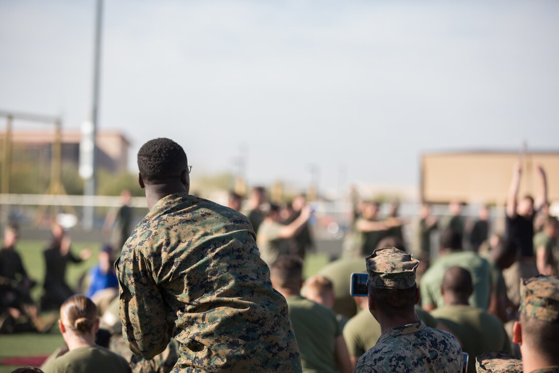 U.S. Marines stationed at Marine Corps Air Station (MCAS) Yuma, observe the Tug-O-War event during the 3rd Annual Super Squadron at the MCAS Yuma Memorial Sports Complex January 11, 2019. The Super Squadron is a friendly competition between the various units on station, designed to help strengthen teamwork as well as boost station morale. Marine Air Control Squadron (MACS) 1 won the competition for the 3rd year in a row, with Headquarters & Headquarters Squadron (H&HS) coming in second. (U.S. Marine Corps photo by Cpl. Sabrina Candiaflores)