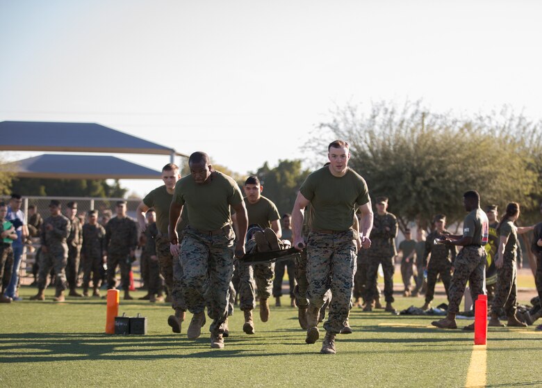 U.S. Marines stationed at Marine Corps Air Station (MCAS) Yuma, compete in the 3rd Annual Super Squadron event at the MCAS Yuma Memorial Sports Complex January 11, 2019. The Super Squadron is a friendly competition between the various units on station, designed to help strengthen teamwork as well as boost station morale. Marine Air Control Squadron (MACS) 1 won the competition for the 3rd year in a row, with Headquarters & Headquarters Squadron (H&HS) coming in second. (U.S. Marine Corps photo by Cpl. Sabrina Candiaflores)