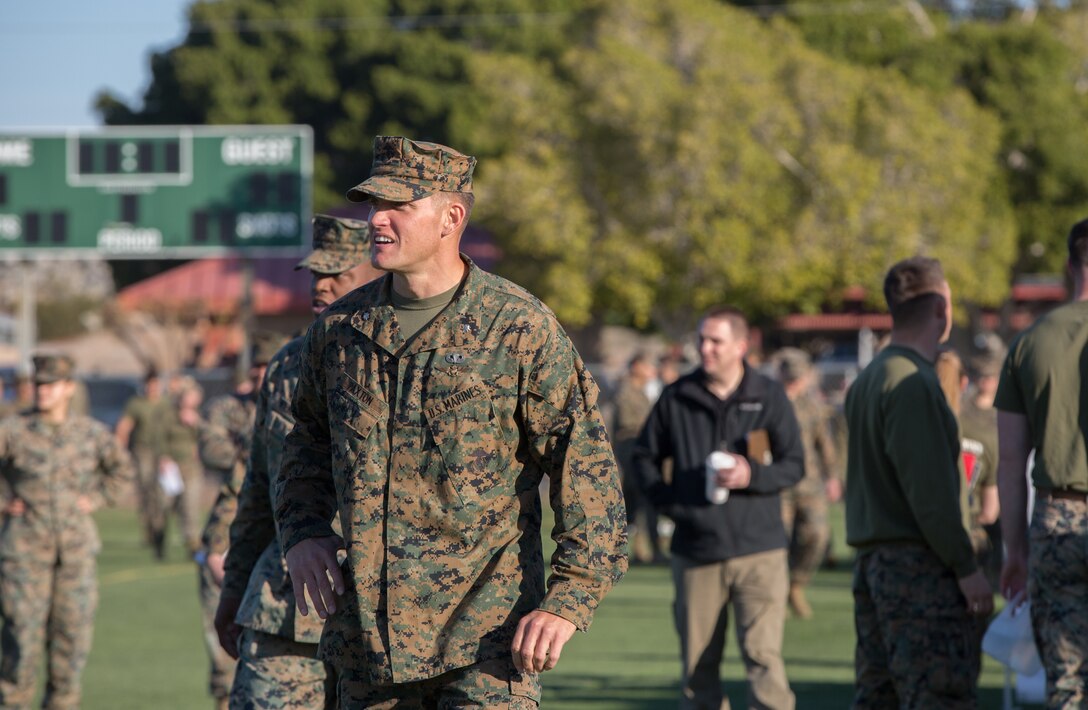 U.S. Marine Corps Lt. Col. James C. Paxton, the Commanding Officer for Headquarters & Headquarters Squadron (H&HS), observes his Marines competing in the 3rd Annual Super Squadron event at the Marine Corps Air Station (MCAS) Yuma Memorial Sports Complex January 11, 2019. The Super Squadron is a friendly competition between the various units on station, designed to help strengthen teamwork as well as boost station morale. Marine Air Control Squadron (MACS) 1 won the competition for the 3rd year in a row, with Headquarters & Headquarters Squadron (H&HS) coming in second. (U.S. Marine Corps photo by Cpl. Sabrina Candiaflores)