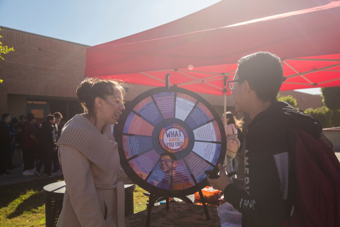 U.S. Marines stationed at Marine Corps Air Station (MCAS) Yuma and personnel from MCAS Yuma interact with high school students and speak about the risks of drugs and alcohol at Cibola High School in Yuma, Ariz., Jan. 22, 2019. The Marines and personnel used games and "beer goggles" to demonstrate the affects of alcohol and drugs. (U.S. Marine Corps photo by Cpl. Sabrina Candiaflores)