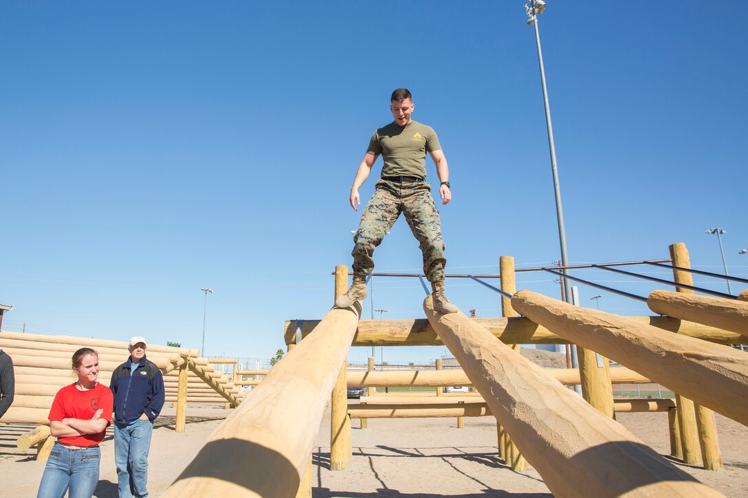 The Young Marines and Boy Scouts from Kingman, Ariz., visited Marine Corps Air Station (MCAS) Yuma Feb. 8, 2019. U.S. Marines stationed at MCAS Yuma demonstrated Explosive Ordnance Disposal (EOD) capabilities, Marine Corps Martial Arts Program (MCMAP) techniques, the Obstacle Course, and the Combat Fitness Test (CFT). The Young Marines and Boy Scouts also participated in some of these events. (U.S. Marine Corps photo by Cpl. Sabrina Candiaflores)