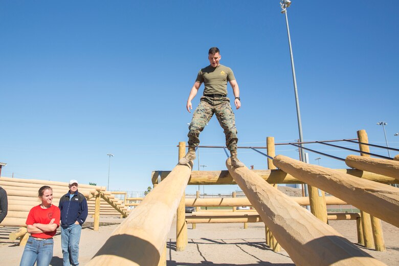 The Young Marines and Boy Scouts from Kingman, Ariz., visited Marine Corps Air Station (MCAS) Yuma Feb. 8, 2019. U.S. Marines stationed at MCAS Yuma demonstrated Explosive Ordnance Disposal (EOD) capabilities, Marine Corps Martial Arts Program (MCMAP) techniques, the Obstacle Course, and the Combat Fitness Test (CFT). The Young Marines and Boy Scouts also participated in some of these events. (U.S. Marine Corps photo by Cpl. Sabrina Candiaflores)