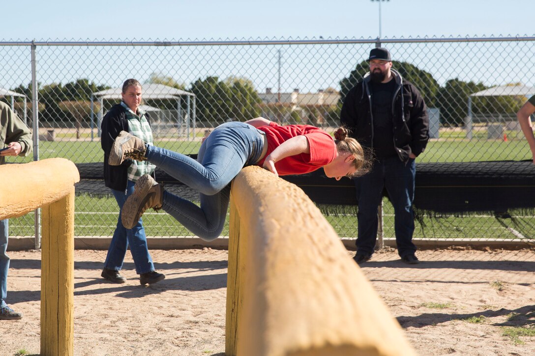 The Young Marines and Boy Scouts from Kingman, Ariz., visited Marine Corps Air Station (MCAS) Yuma Feb. 8, 2019. U.S. Marines stationed at MCAS Yuma demonstrated Explosive Ordnance Disposal (EOD) capabilities, Marine Corps Martial Arts Program (MCMAP) techniques, the Obstacle Course, and the Combat Fitness Test (CFT). The Young Marines and Boy Scouts also participated in some of these events. (U.S. Marine Corps photo by Cpl. Sabrina Candiaflores)