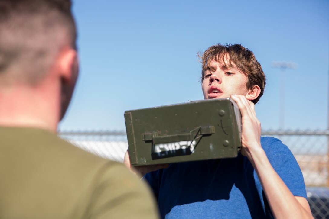 The Young Marines and Boy Scouts from Kingman, Ariz., visited Marine Corps Air Station (MCAS) Yuma Feb. 8, 2019. U.S. Marines stationed at MCAS Yuma demonstrated Explosive Ordnance Disposal (EOD) capabilities, Marine Corps Martial Arts Program (MCMAP) techniques, the Obstacle Course, and the Combat Fitness Test (CFT). The Young Marines and Boy Scouts also participated in some of these events. (U.S. Marine Corps photo by Cpl. Sabrina Candiaflores)