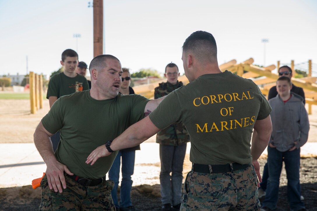 The Young Marines and Boy Scouts from Kingman, Ariz., visited Marine Corps Air Station (MCAS) Yuma Feb. 8, 2019. U.S. Marines stationed at MCAS Yuma demonstrated Explosive Ordnance Disposal (EOD) capabilities, Marine Corps Martial Arts Program (MCMAP) techniques, the Obstacle Course, and the Combat Fitness Test (CFT). The Young Marines and Boy Scouts also participated in some of these events. (U.S. Marine Corps photo by Cpl. Sabrina Candiaflores)