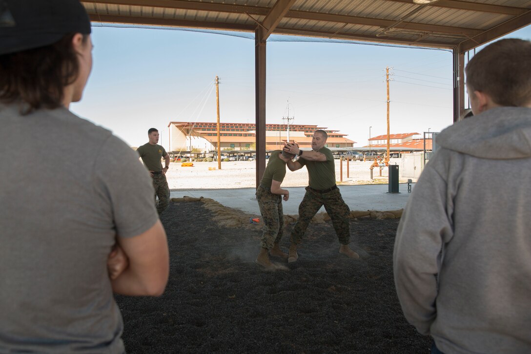 The Young Marines and Boy Scouts from Kingman, Ariz., visited Marine Corps Air Station (MCAS) Yuma Feb. 8, 2019. U.S. Marines stationed at MCAS Yuma demonstrated Explosive Ordnance Disposal (EOD) capabilities, Marine Corps Martial Arts Program (MCMAP) techniques, the Obstacle Course, and the Combat Fitness Test (CFT). The Young Marines and Boy Scouts also participated in some of these events. (U.S. Marine Corps photo by Cpl. Sabrina Candiaflores)