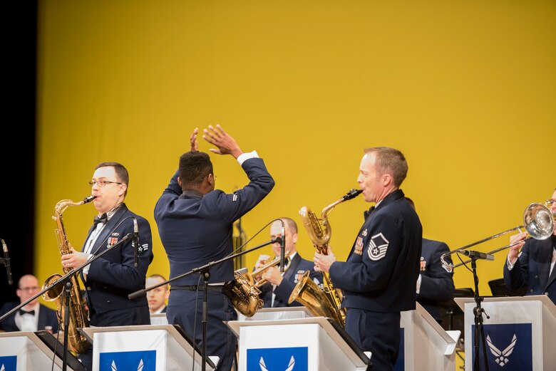 Members of the USAF Band of the Pacific play during the Japan-U.S. Joint Concert Feb. 24, 2019, at the Hamura Learning Center in Hamura, Tokyo, Japan. The concert included various jazz, big band, and orchestra performance numbers by the USAF Band of the Pacific and the Hamura Daiichi Jr. High School Band. (U.S. Air Force photo by Senior Airman Donald Hudson)