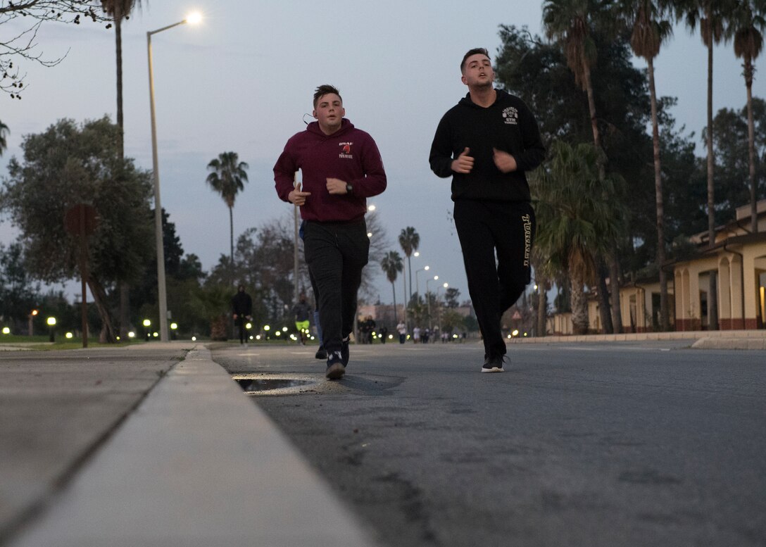Members of the 39th Air Base Wing run to commemorate four World War II Army chaplains who sacrificed their own lives aboard the USS Dorchester by giving up their lifejackets to save others as the ship sank at Incirlik Air Base, Turkey, Feb. 22, 2019.