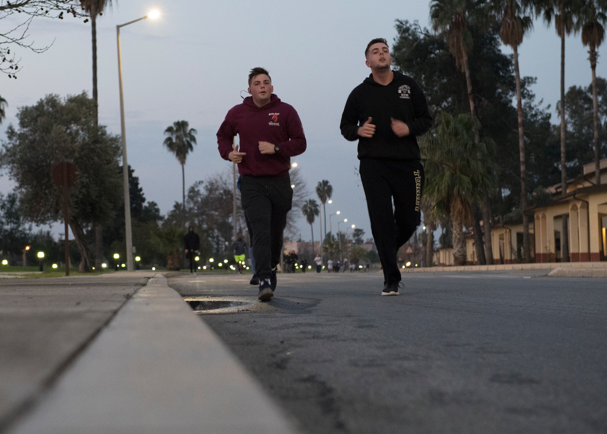 Members of the 39th Air Base Wing run to commemorate four World War II Army chaplains who sacrificed their own lives aboard the USS Dorchester by giving up their lifejackets to save others as the ship sank at Incirlik Air Base, Turkey, Feb. 22, 2019.