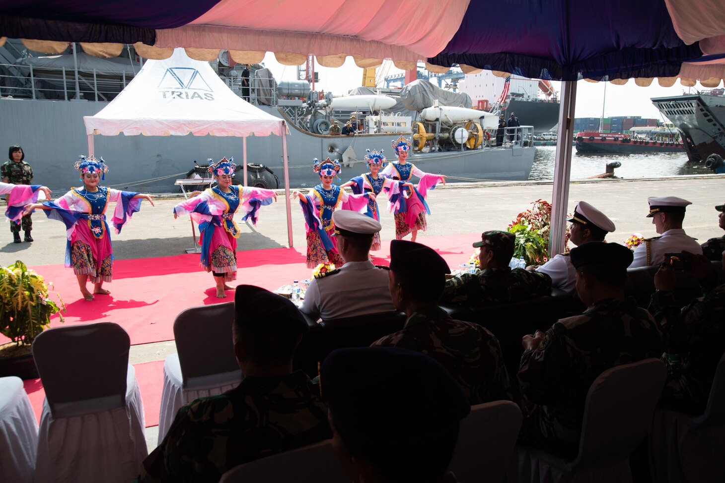 JAKARTA, Indonesia (Feb. 26, 2019) Senior leadership of the Avenger class mine countermeasures ship USS Chief (MCM 14) observe a traditional Indonesian dance during a welcoming ceremony hosted by the Indonesian Navy (TNI-AL). Chief is visiting Jakarta while operating in U.S. 7th Fleet to work with their Indonesian Navy (TNI-AL) counterparts to strengthen regional security and stability, and enhance interoperability.