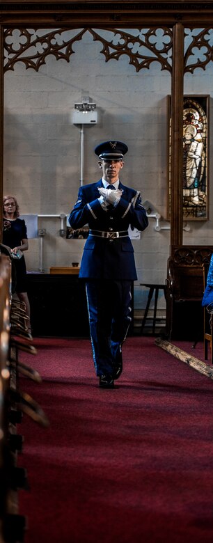 U.S. Air Force Airman First Class Joshua Holsing cradles the American flag while marching down the aisle of St. Augustine’s church in Sheffield, United Kingdom, February 24th. This year’s annual memorial service was accompanied by a United States Air Force and Royal Air Force flypast in Endcliffe Park two days prior, where thousands of U.K. residents honored the memory of ten fallen U.S. Airmen who died when their war-crippled B-17 Flying Fortress crash landed to avoid killing residents and nearby children. (U.S. Air Force photo by Tech Sgt. Aaron Thomasson)