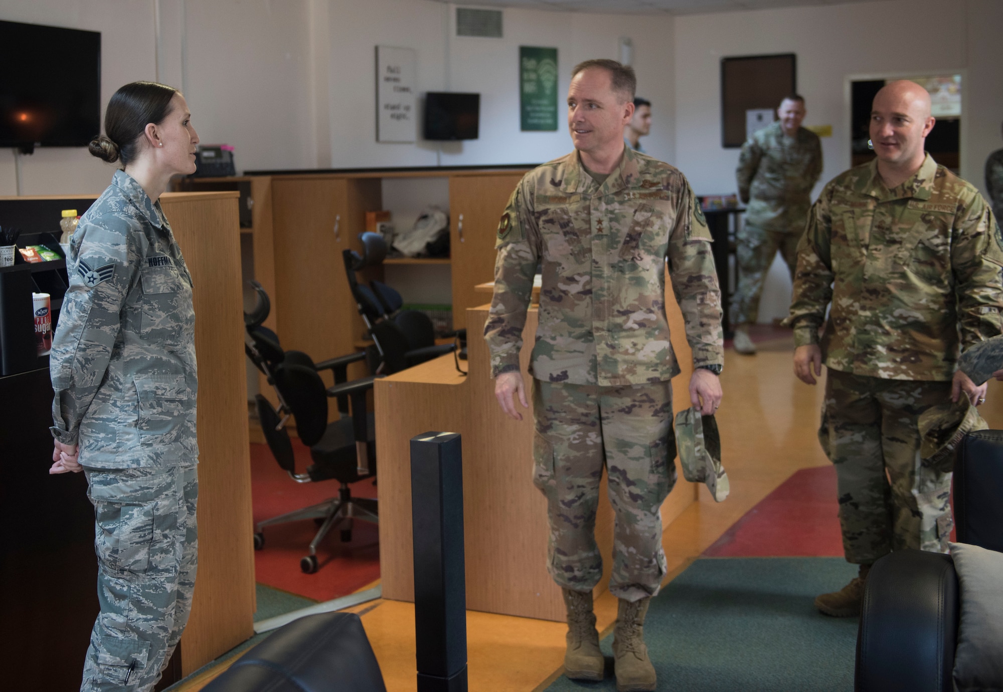 Senior Airman Kayla Hoffman, 728th Air Mobility Squadron commander’s support staff, briefs U.S. Air Force Maj. Gen. John M. Wood, and U.S. Air Force Chief Master Sgt. Anthony Cruz Munoz, Third Air Force command chief, about the Titan’s Refuge, at Incirlik Air Base, Turkey, Feb. 22, 2019.